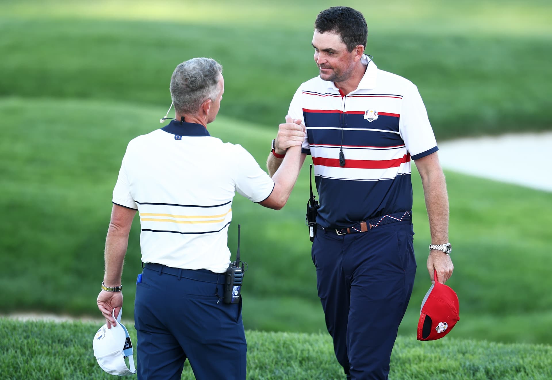 FARMINGDALE, NEW YORK - SEPTEMBER 28: (L-R) Captain Luke Donald of Team Europe and Captain Keegan Bradley of Team United States shake hands after the Sunday singles matches of the 2025 Ryder Cup at Black Course at Bethpage State Park Golf Course on September 28, 2025 in Farmingdale, New York. (Photo by Jared C. Tilton/Getty Images)
