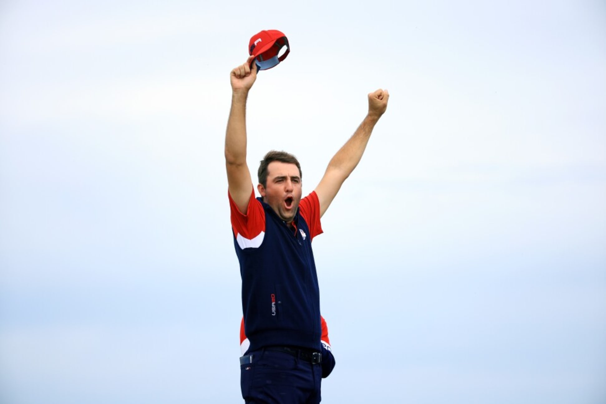 KOHLER, WISCONSIN - SEPTEMBER 26: Scottie Scheffler of team United States celebrates on the 15th green after defeating Jon Rahm of Spain and team Europe 4&3 during Sunday Singles Matches of the 43rd Ryder Cup at Whistling Straits on September 26, 2021 in Kohler, Wisconsin. (Photo by Mike Ehrmann/Getty Images)