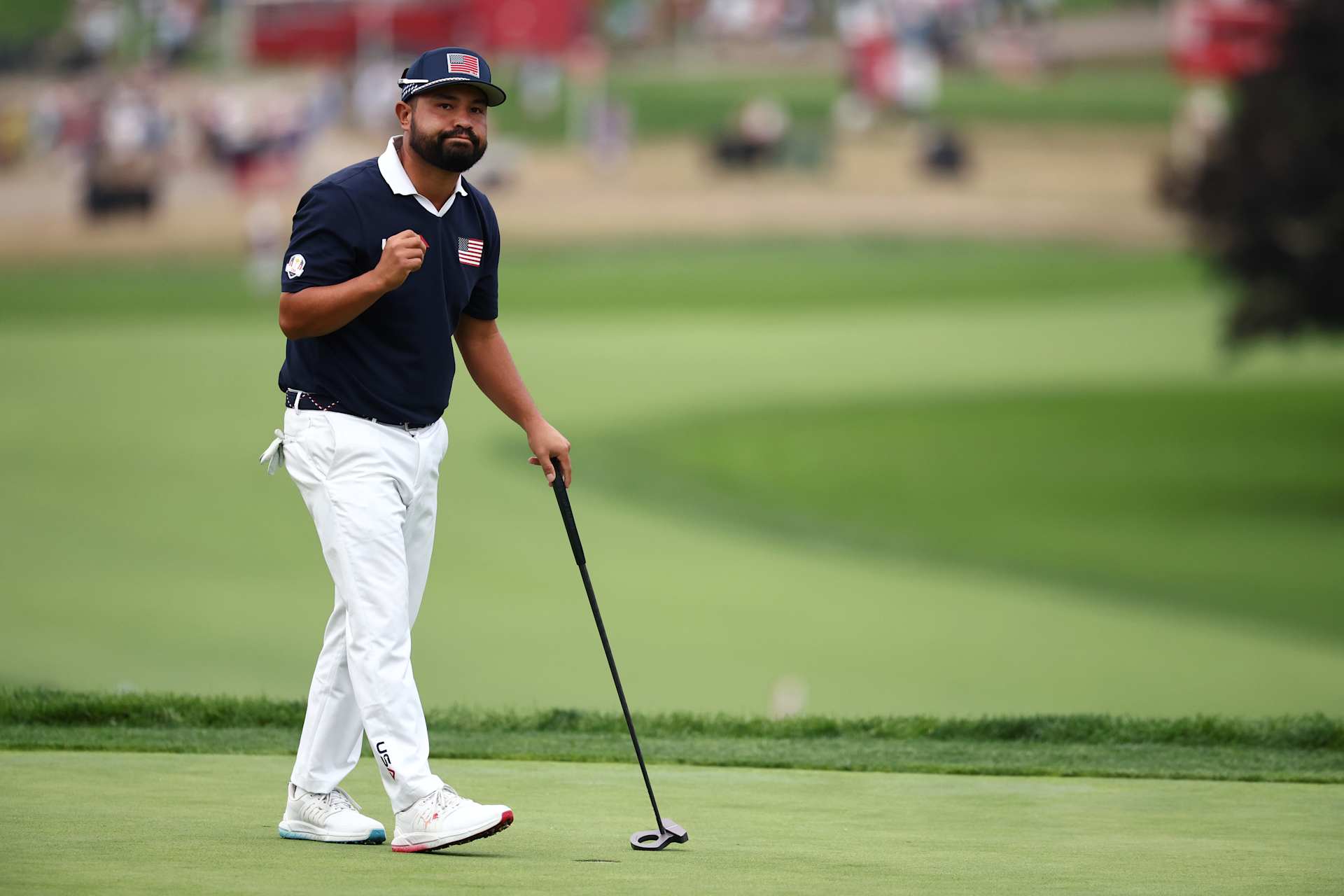 FARMINGDALE, NEW YORK - SEPTEMBER 27: J.J. Spaun of Team United States reacts after making a birdie on the 18th hole as he and teammate Xander Schauffele defeated Jon Rahm and Sepp Straka of Team Europe, 1-up, during the Saturday afternoon four-balls matches of the 2025 Ryder Cup at Black Course at Bethpage State Park Golf Course on September 27, 2025 in Farmingdale, New York. (Photo by Jared C. Tilton/Getty Images)